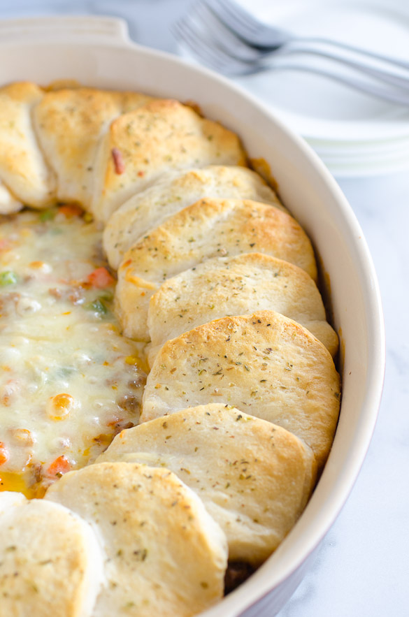 biscuit topped casserole in oval dish