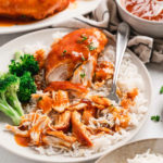 Tender apricot chicken breasts served over rice with sauce