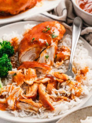 Tender apricot chicken breasts served over rice with sauce