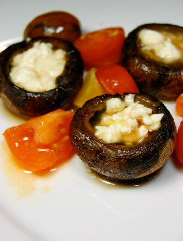 It takes very little effort to make these flavorful Feta Stuffed Mushrooms.