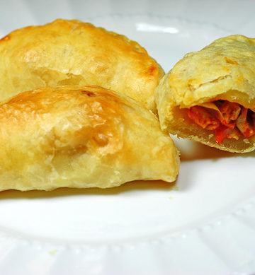 Cheese and Olive Empanadillas are put together with puff pastry for an empanada appetizer.
