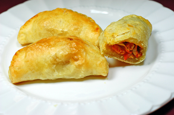 Cheese and Olive Empanadillas are put together with puff pastry for an empanada appetizer.