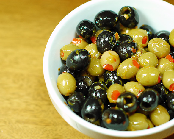 Marinated Olives are easy to prepare yet complex with delicious flavor!  Use different types of olives to create many variations.