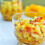 An easy Pineapple Mango Salsa recipe you can dip your chips into or use in various dishes like Pineapple Mango Pizza!  This fresh homemade pineapple salsa comes together quickly and is full of wonderful flavors!
