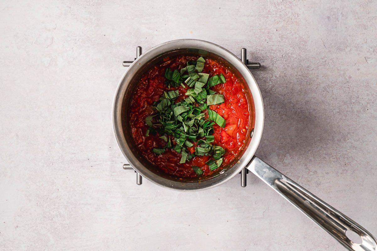 homemade pizza sauce in pan for chicago style pizza