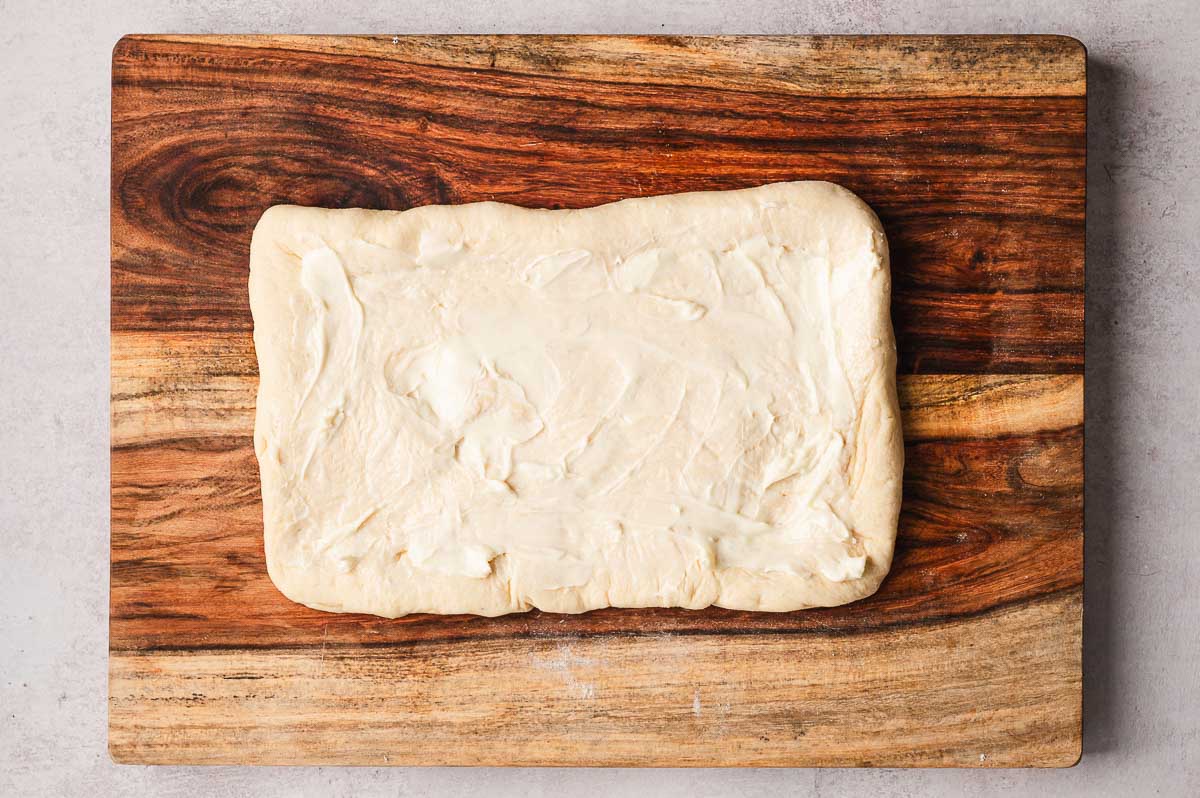 dough for deep dish pizza in a rectangle ready for lamination