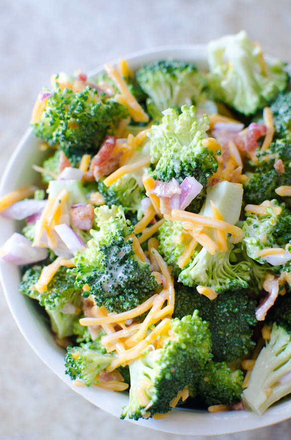 A fresh crisp broccoli salad tossed with a simple tangy homemade dressing. Broccoli salad is a quick salad everyone loves for any gathering, potluck, party, etc.
