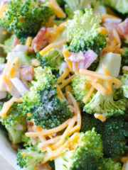 A fresh crisp broccoli salad tossed with a simple tangy homemade dressing. Broccoli salad is a quick salad everyone loves for any gathering, potluck, party, etc.