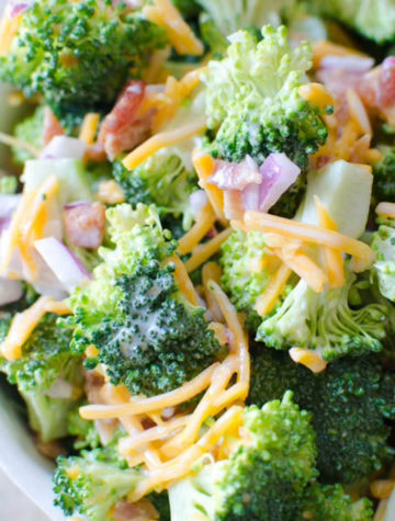 A fresh crisp broccoli salad tossed with a simple tangy homemade dressing. Broccoli salad is a quick salad everyone loves for any gathering, potluck, party, etc.