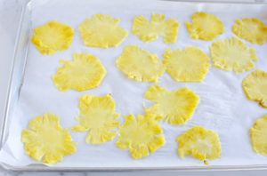 pineapple slices on baking sheet