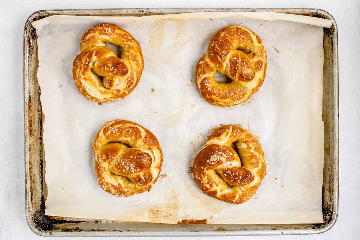 baked soft pretzels on baking pan