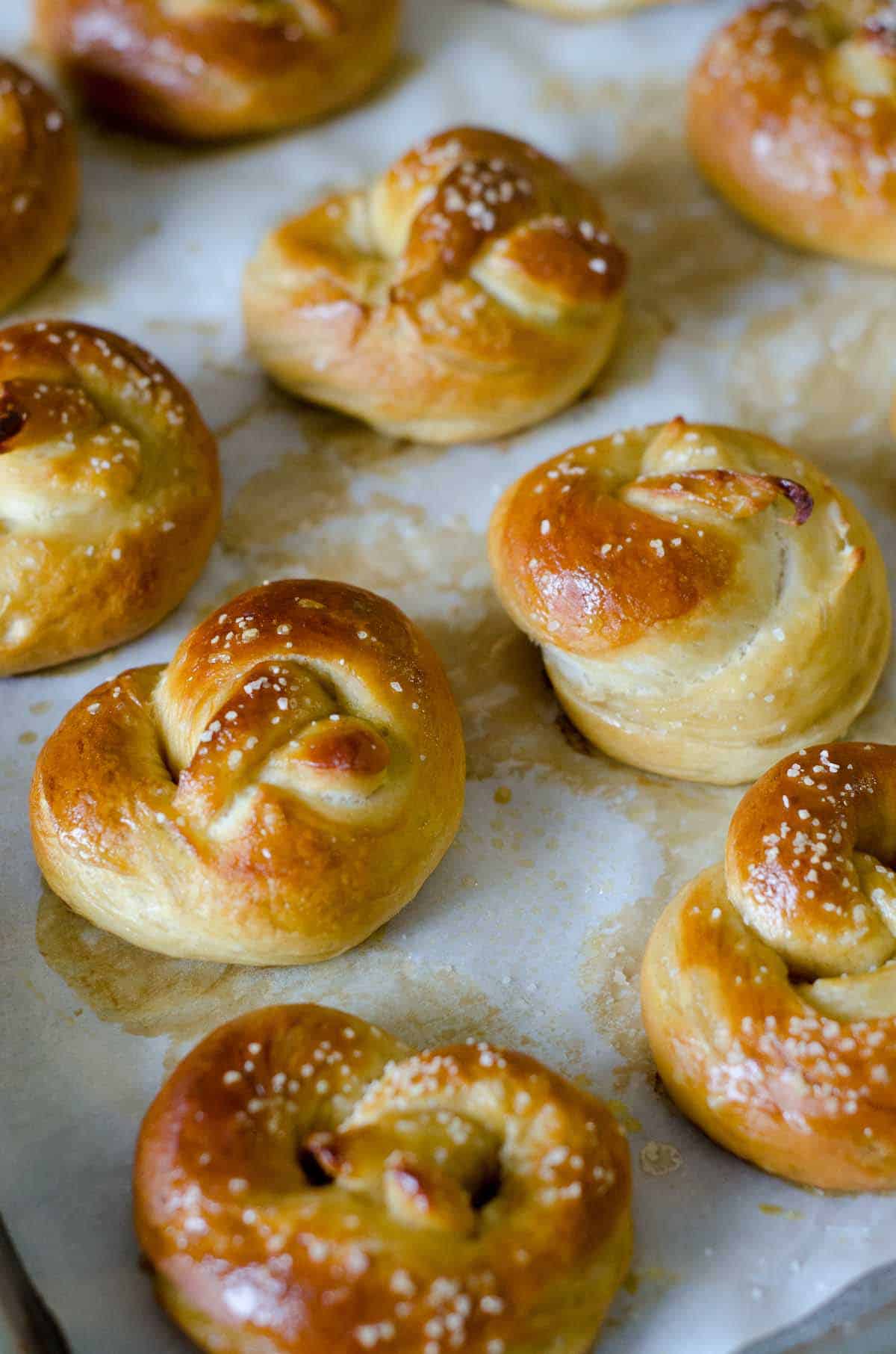 miniature soft pretzels on a baking sheet