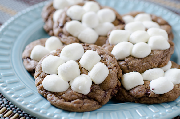 Hot Chocolate Cookies are chocolate cookies baked with hot cocoa mix and topped with gooey mini marshmallows that puff perfectly in the oven. These Hot Chocolate Cookies are perfect for a Christmas cookie exchange!