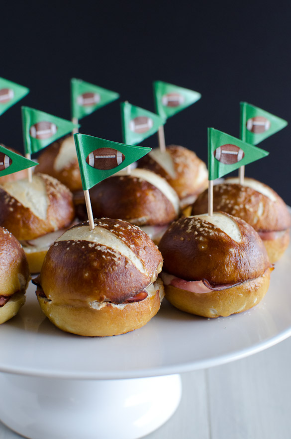 These Ham and Cheese Soft Pretzel Sliders are the perfect finger food for your tailgate party on game day. Everyone loves a good soft pretzel bun!