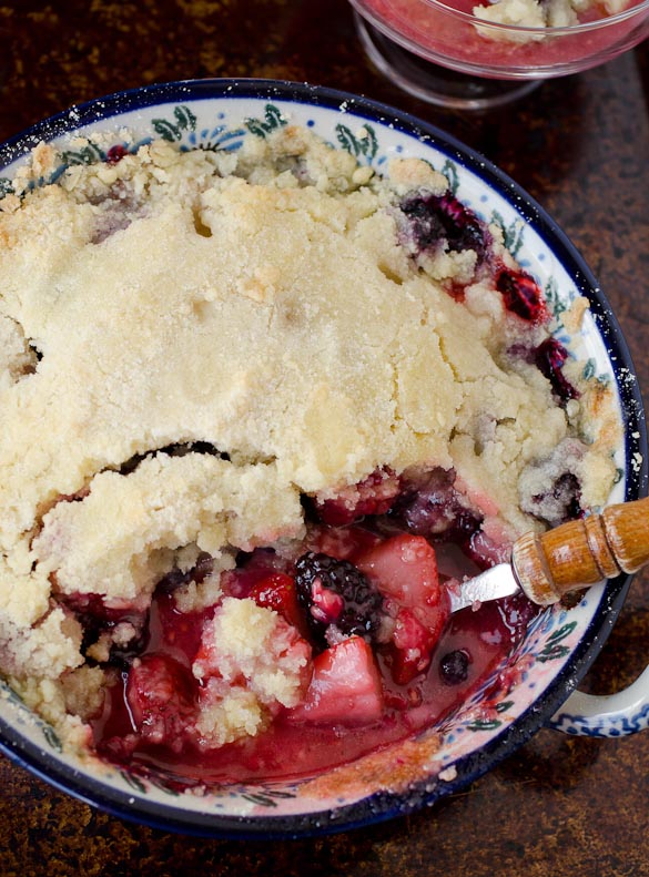 Our favorite tried and true Berry Cobbler Recipe with a crumb topping. This Favorite Berry Cobbler stands amazing on its own or is served warm with ice cream.