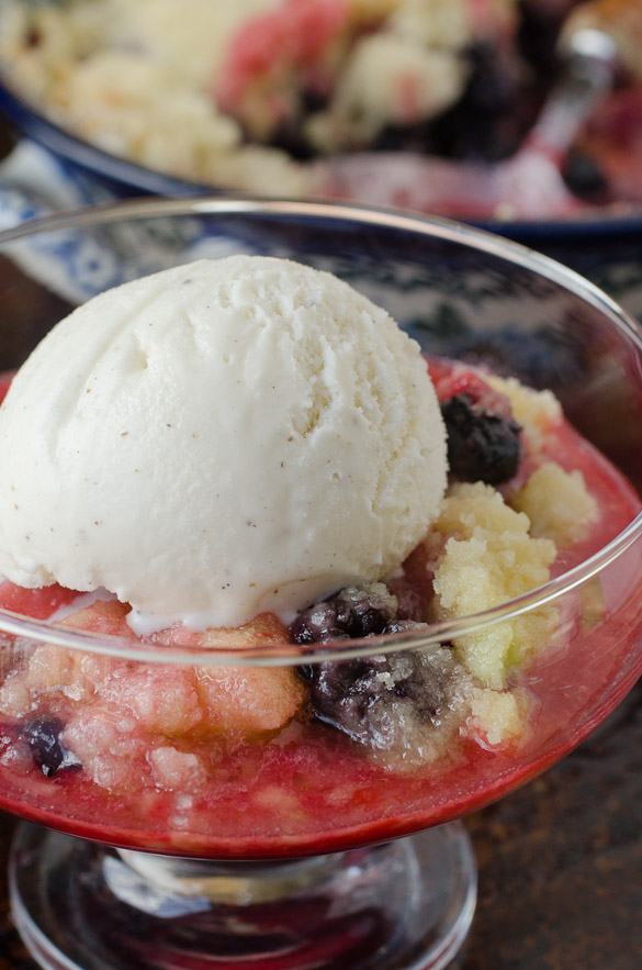 Our favorite tried and true Berry Cobbler Recipe with a crumb topping. This Favorite Berry Cobbler stands amazing on its own or is served warm with ice cream.