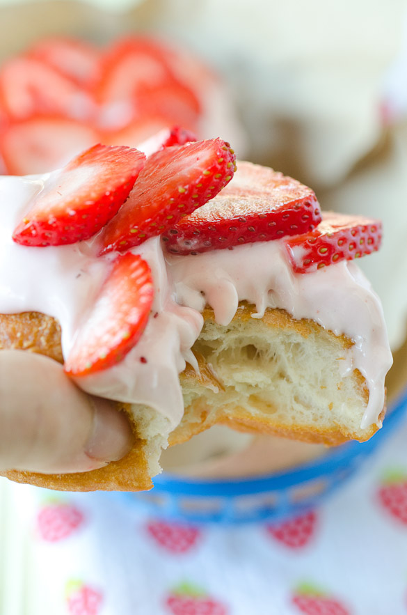 Strawberry Cream Donuts are a quick breakfast treat using refrigerated biscuit dough. These delicious donuts are topped with my favorite strawberry cream cheese frosting.