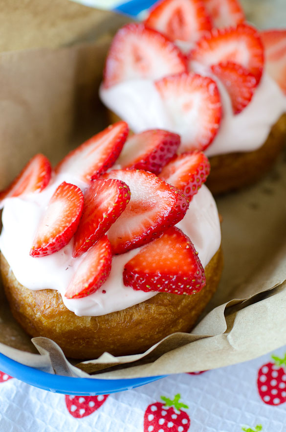 Strawberry Cream Donuts are a quick breakfast treat using refrigerated biscuit dough. These delicious donuts are topped with my favorite strawberry cream cheese frosting.