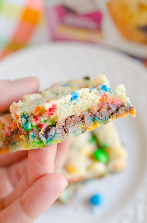 Put Krusteaz's new Molten Deep Dish Cookie mix to use and whip up these sugar cookie bars that have a layer of chocolate and are peppered with sprinkles.