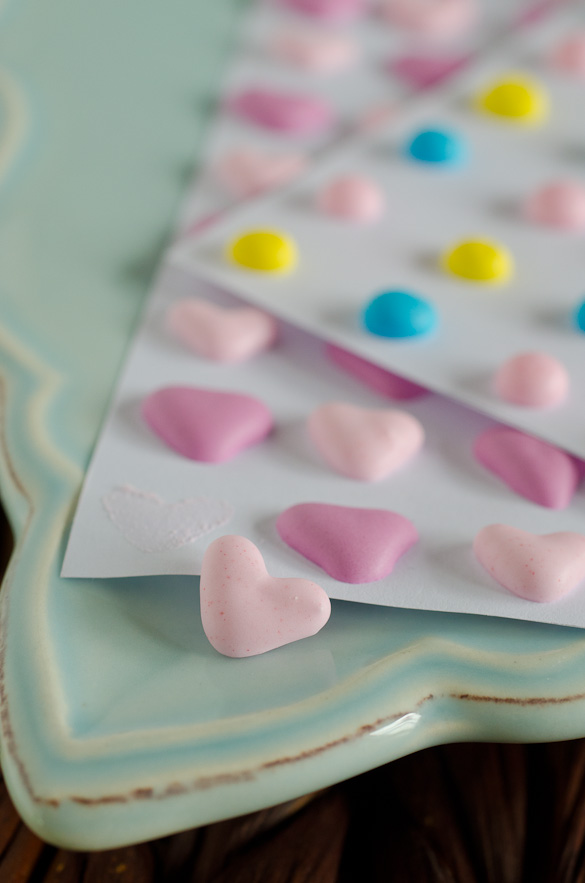 Homemade candy dots and hearts on a plate.