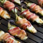 bacon wrapped jalapeno poppers on the grill