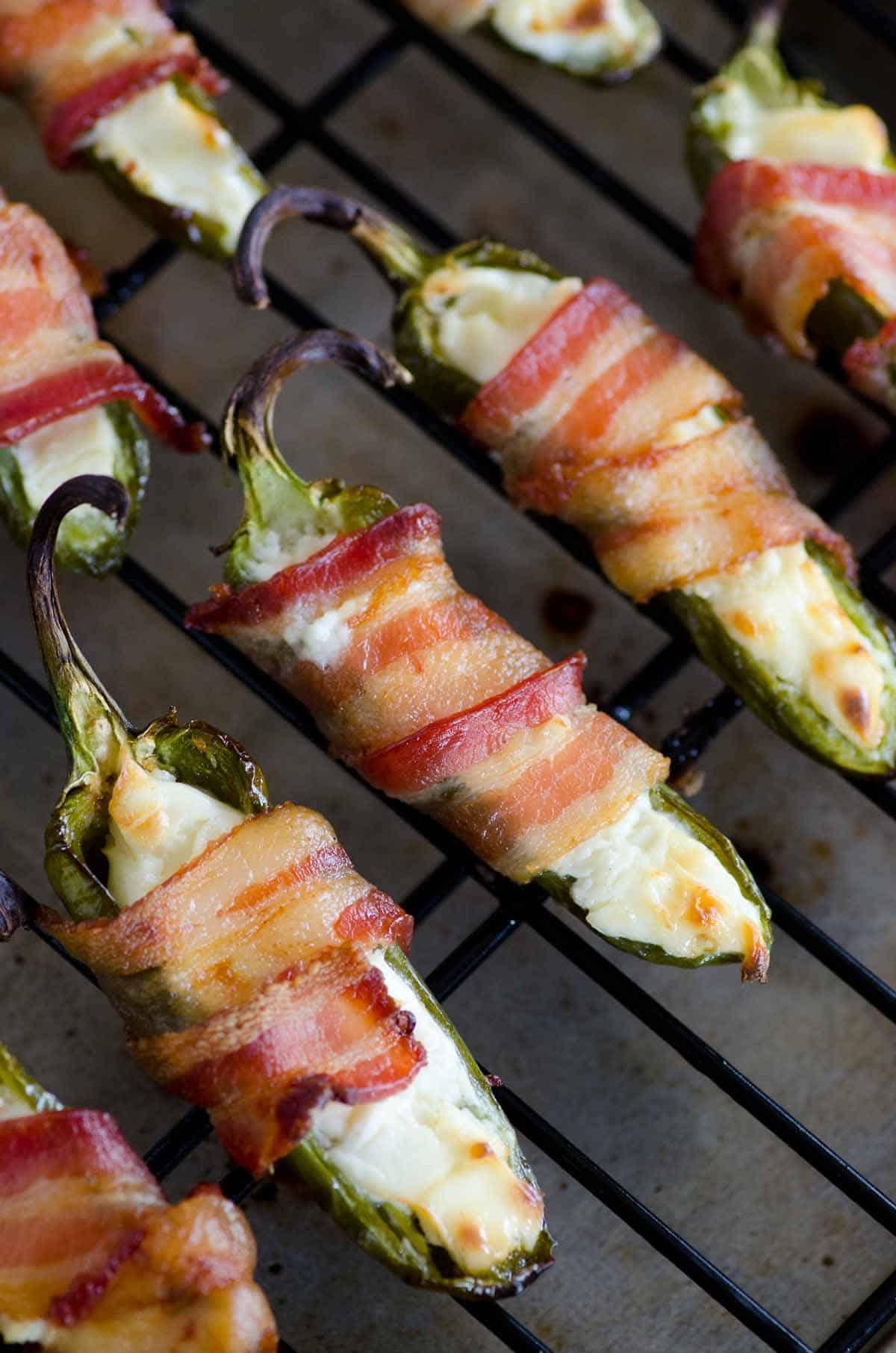 bacon wrapped and cream cheese stuffed jalapeno poppers