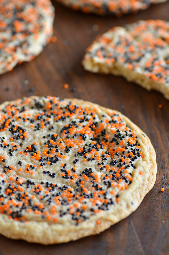 Round sugar cookie with halloween sprinkles.
