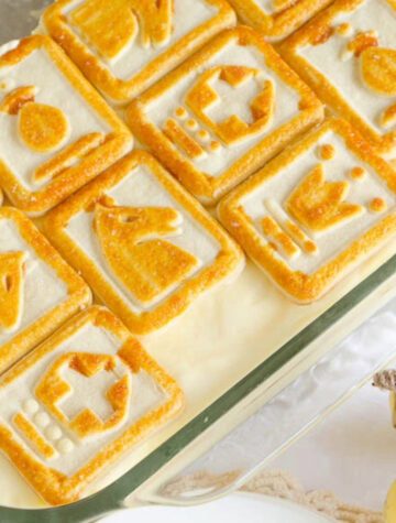 9x13 of banana pudding topped with chessmen cookies