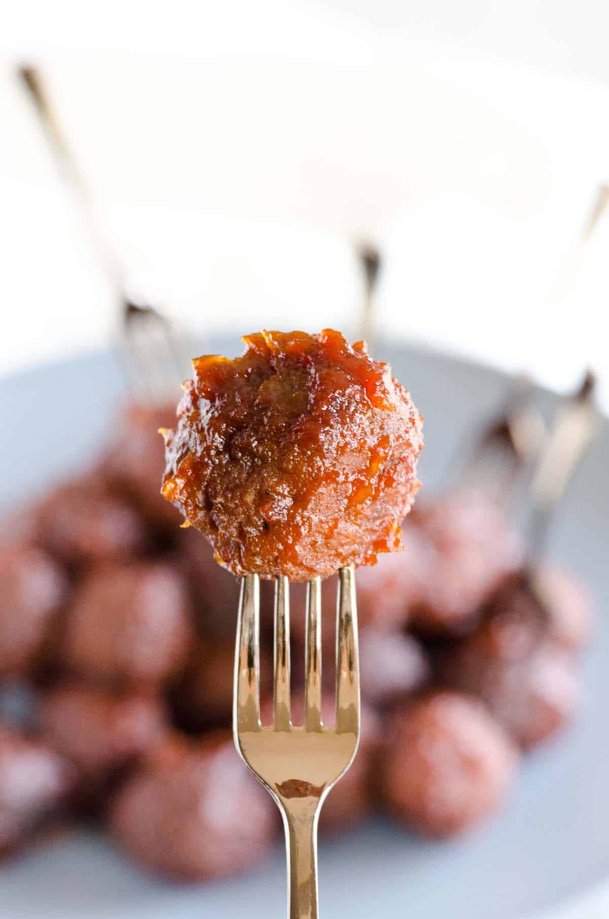 sweet and sour meatball on a fork