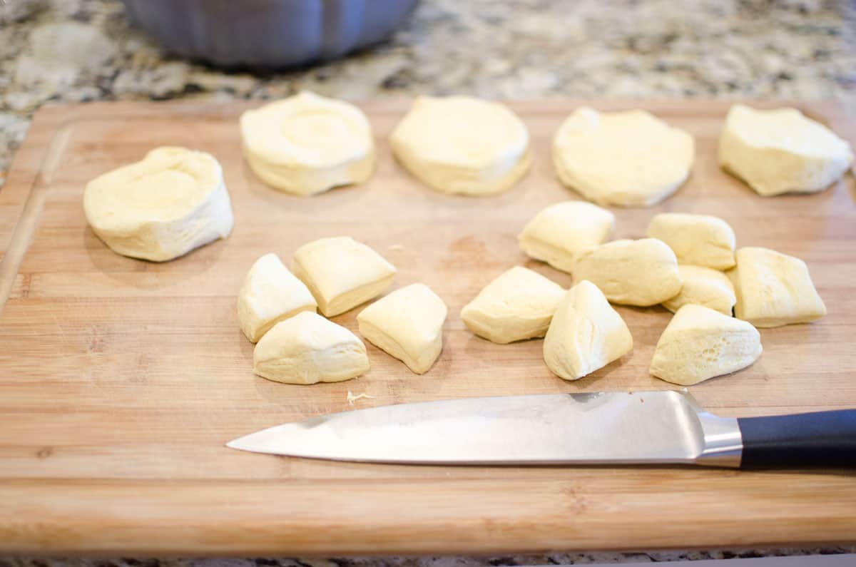 cutting biscuit dough into quarters