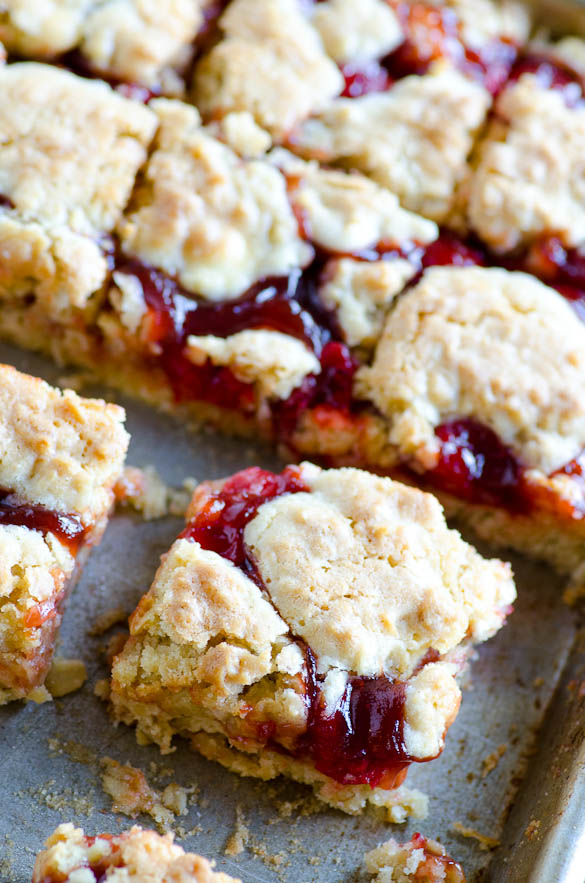 Apple Butter Cherry Cobbler Bars - These cherry cobbler bars have added depth of flavor with a secret ingredient. Simple and sweet with cherry pie filling and the great, unique taste of Musselman's Apple Butter.