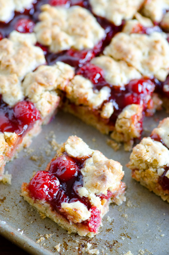 Apple Butter Cherry Cobbler Bars - These cherry cobbler bars have added depth of flavor with a secret ingredient. Simple and sweet with cherry pie filling and the great, unique taste of Musselman's Apple Butter. 