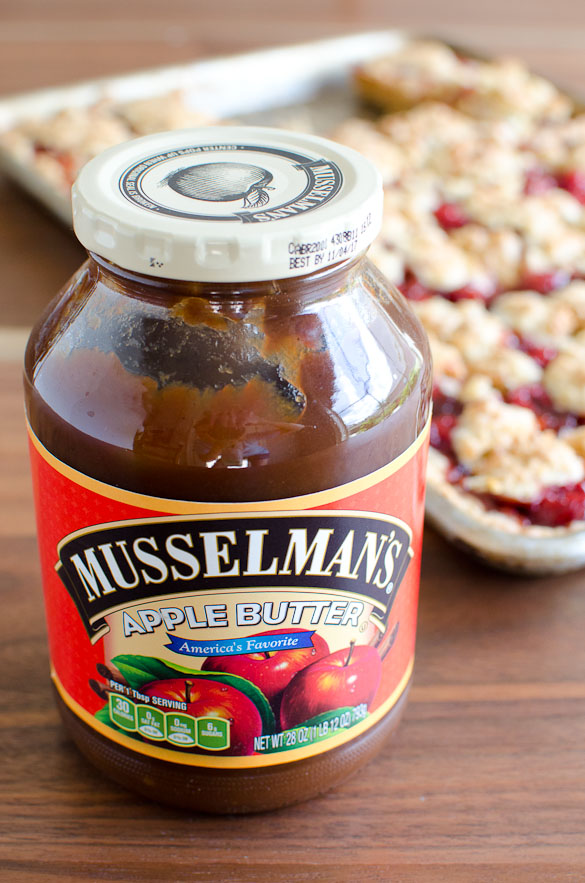 Apple Butter Cherry Cobbler Bars - These cherry cobbler bars have added depth of flavor with a secret ingredient. Simple and sweet with cherry pie filling and the great, unique taste of Musselman's Apple Butter. 