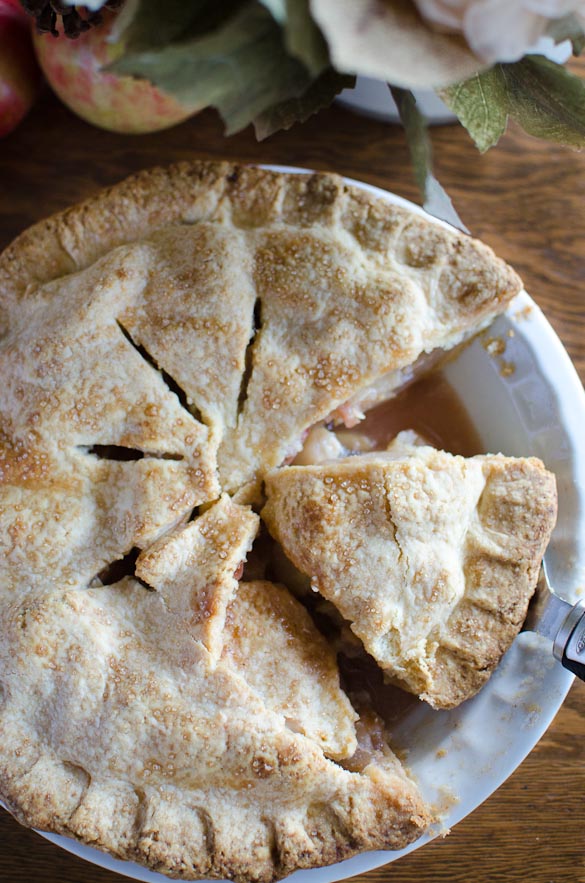 Our favorite homemade apple pie recipe for over 10 years! It's simple and delicious, and requires zero chill time for the dough. This American favorite uses basic ingredients like flour, sugar and cold butter for a quick and flaky crust!