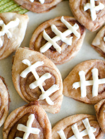 These Cinnamon Swirl Football Cookies are a fun tailgate food and a treat for your kids on game day. Use a refrigerated pie crust dough for a simple recipe.