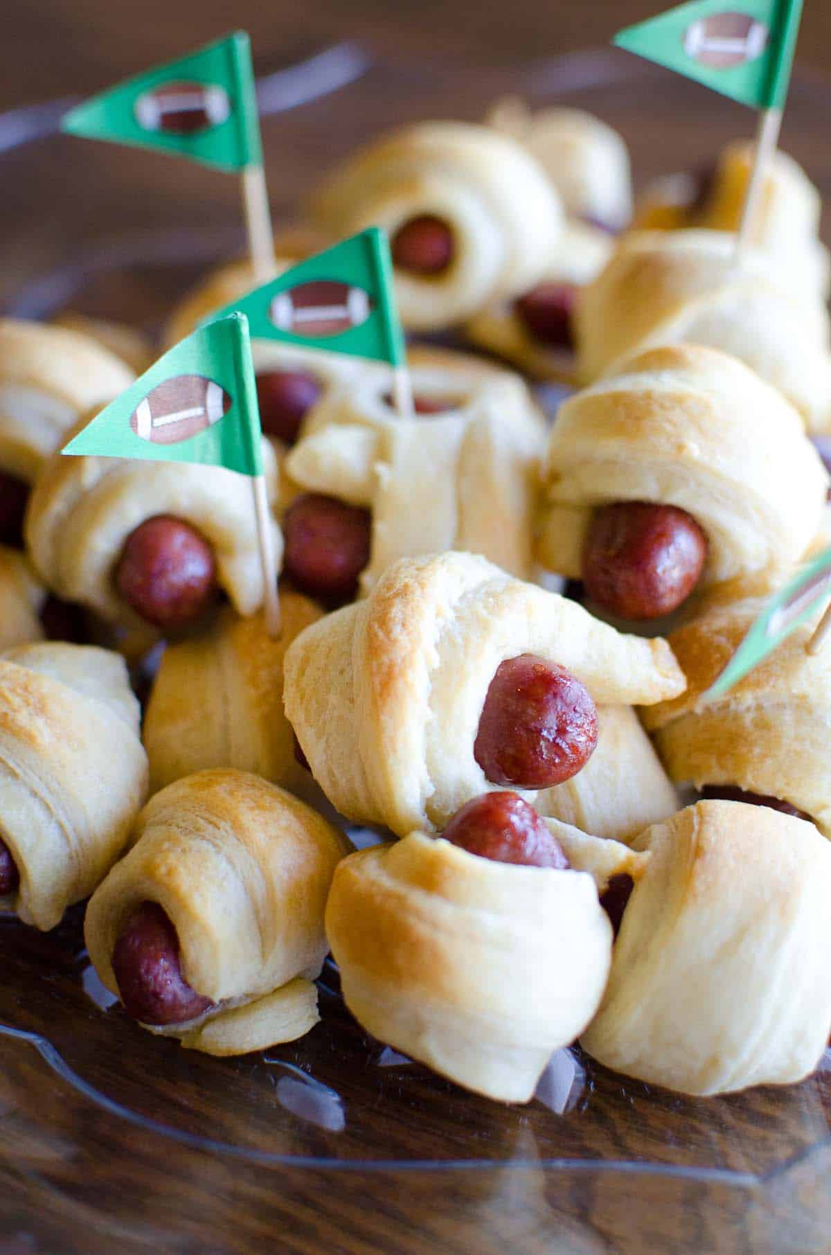 lil smokies wrapped in crescent dough on a platter
