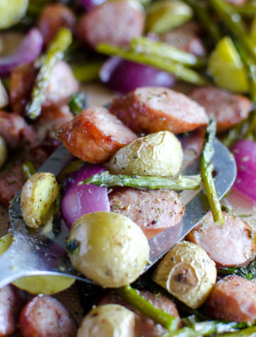 Easy dinner tonight using only one pan with this Sheet Pan Kielbasa and Vegetables recipe. Roasted links and your choice of vegetables on one large cooking tray - lined with foil for easy clean up!