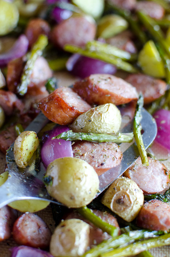 Easy dinner tonight using only one pan with this Sheet Pan Kielbasa and Vegetables recipe. Roasted links and your choice of vegetables on one large cooking tray - lined with foil for easy clean up!