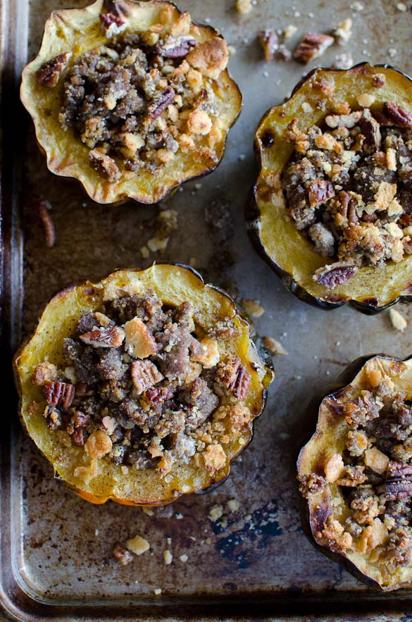 This easy weeknight dinner (or breakfast!) involves cooking stuffed acorn squash in the oven with a flavorful sausage and pecan filling. This Sausage-Stuffed Acorn Squash recipe will soon turn into your family's favorite.