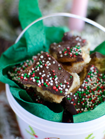 This Christmas Crack Toffee recipe is the most delicious chocolate toffee bark made with crackers. Ritz crackers are coated with caramel and chocolate resulting in the EASIEST sweet and salty Christmas candy that no one can resist!