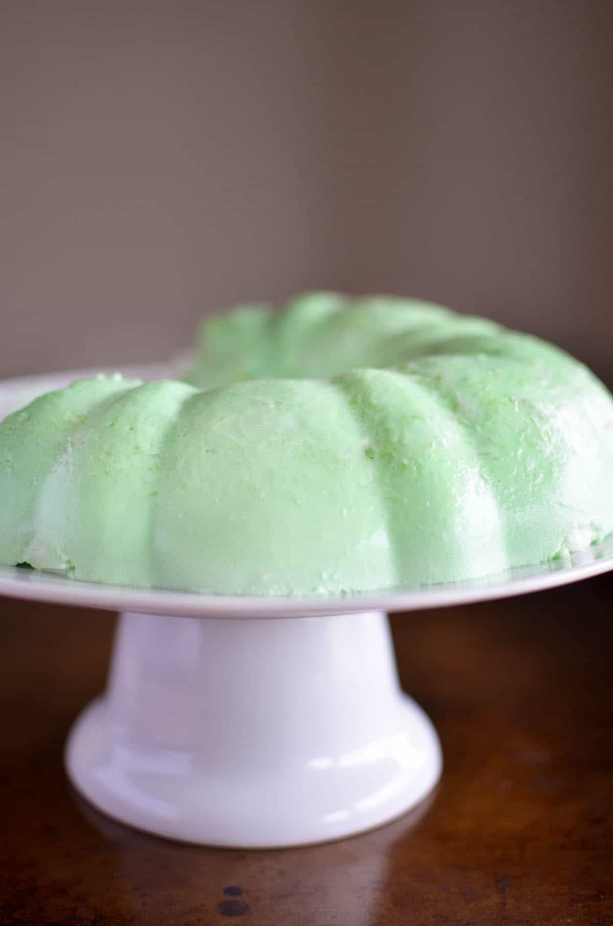 lime green jello mold on white pedestal