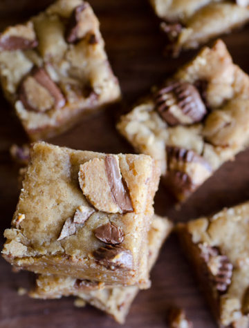 These Peanut Butter Cup Blondies have JUST the right amount of peanut butter flavor. They are gooey and yummy cookie bars with chopped peanut butter cups mixed in. The PERFECT dessert for your chocolate peanut butter craving.