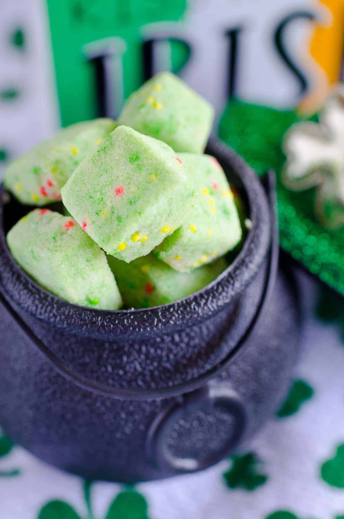 green cookies in a cauldron