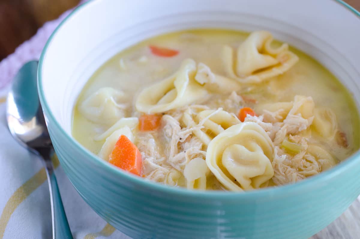 bowl of chicken and cheese tortellini soup