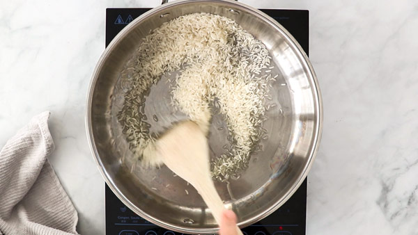 Toasting rice in a pot