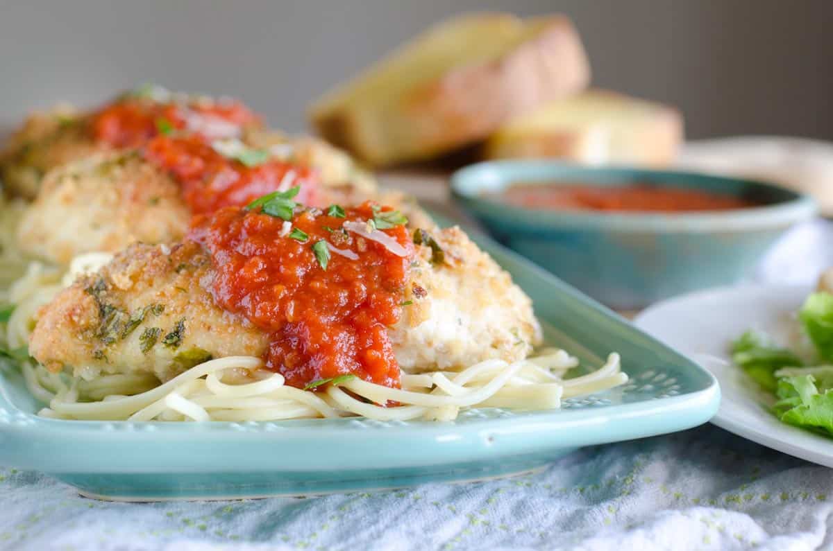 chicken parmesan topped with marinara