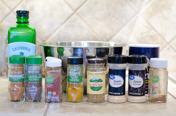 Spices in their container on a countertop.