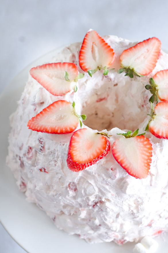 Over top view of strawberry marshmallow angel cake.