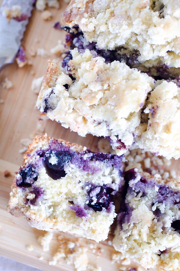 Blueberry muffin bread on cutting board.