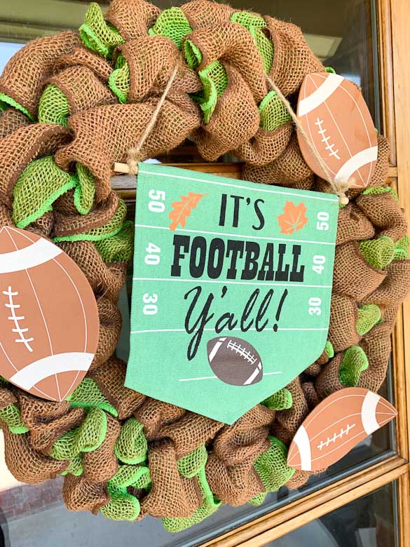 Brown and green burlap wreath with football decorations